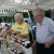 Gail and Clyde Martin with their farmer's market booth in El Dorado Kansas. Gail and Clyde Martin with their farmer's market booth in El Dorado Kansas.