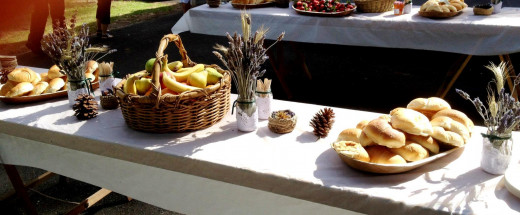 Lavender and wheat arrangements on the food trestles on the day