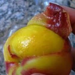 Blanching releases peach skins so that they peel off easily.
