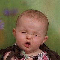 Katelynn Trying to Eat the End of a Flower