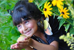[Photo: Wish.org] -- Kassaundra (congenital heart condition, age 7) wishes to be music.