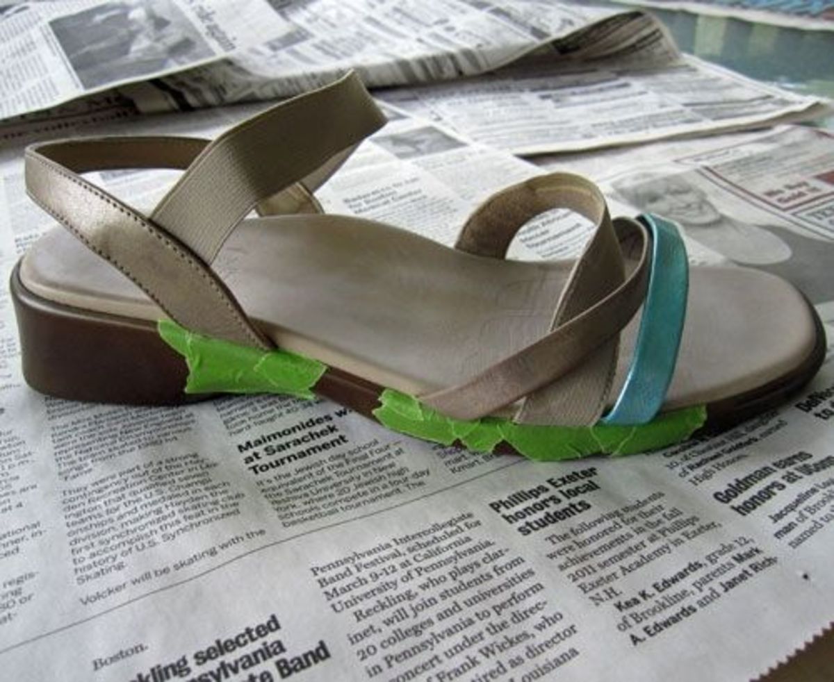 Photo of partially taped off leather sandal prior to painting
