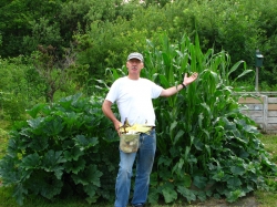 My husband, Bryan Cass, proudly showing off our fabulous garden.
