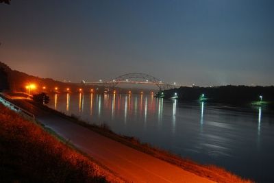The Cape Cod Canal and Sagamore Bridge at night.