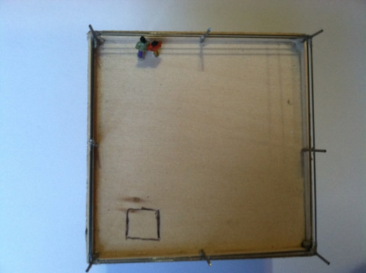 Draw a 5/8" square in one corner of the platform for the steps to enter, about 1/4 from the perimeter on one side, an extra 1/8th from the other