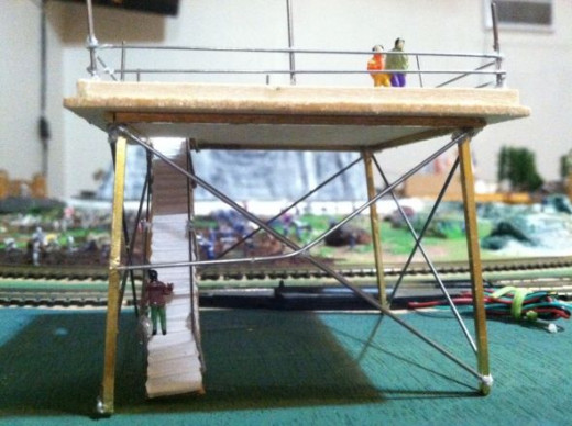 To create a better step entrance, bend one crossbrace to horizontal, cut off, and attach as shown