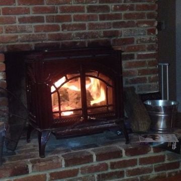My woodstove creates a roaring blaze and can get my living room up to 90 degrees in short order.