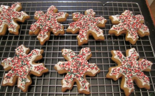 Gingerbread Snowflake cookies with icing and sprinkles