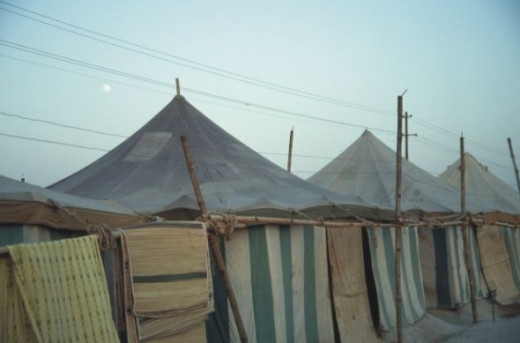 A full moon over one of the tent camps.