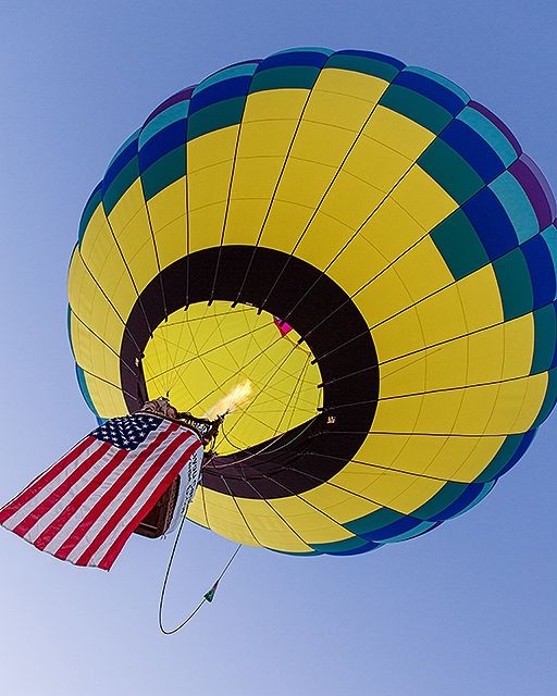 The Star Spangled Banner is played as the American Flag is displayed