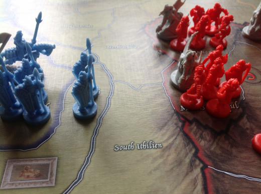 A small army at Osgiliath is all that stands between the forces of Mordor (right) and the fortress city of Minas Tirith (left)