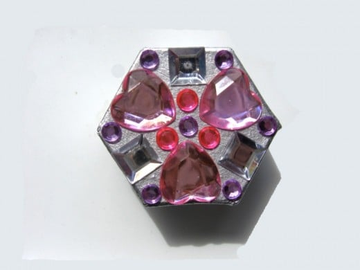 Hexagonal silver trinket box with pink and purple gems