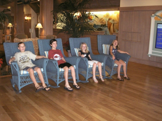 In rockers in the lobby.  Kids waiting for mom and dad to come down.