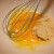 Making the egg yolk mixture.