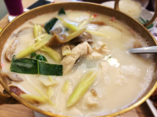 Tom Ka Gai-spicy and sour chicken soup with creamy coconut milk.