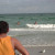 Monks having fun in the ocean. Monks having fun in the ocean.