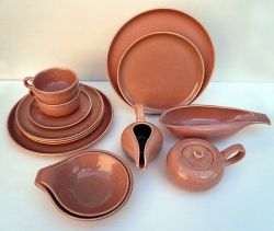 JoeVintage.etsy.com shows an American Modern 14 pc Coral Set (Vintage) For $115