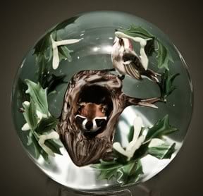 A Raccoon Paperweight by Michael Lee Chin