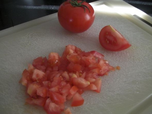 Chopping the tomato