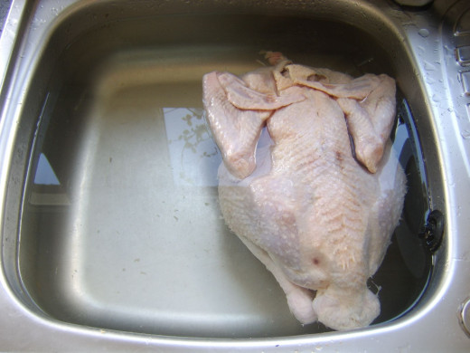 Turkey is carefully washed in cold water