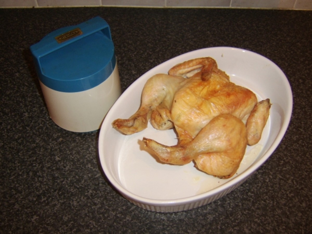 Vegetables are kept warm in the food flask while the chicken rests