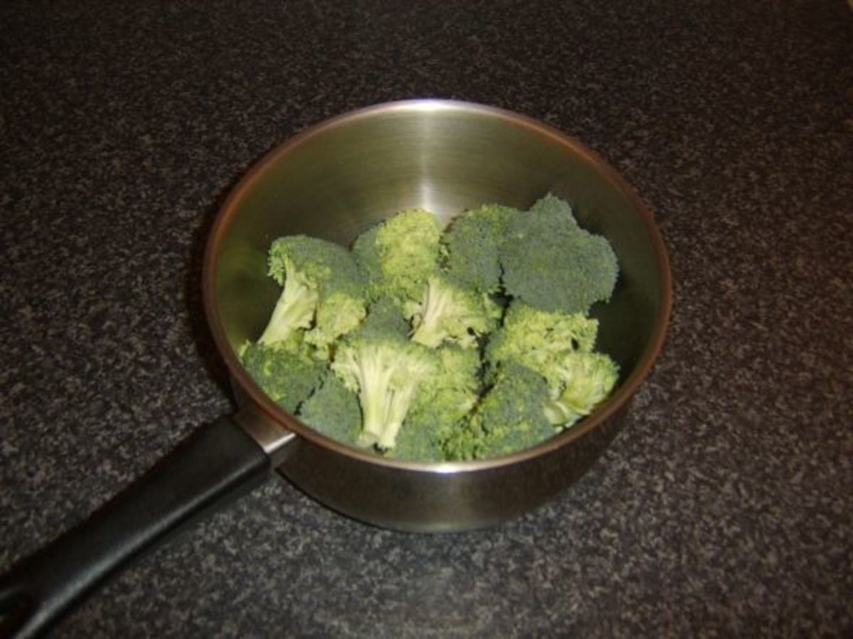 Broccoli is broken in to florets to be boiled