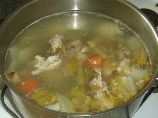 Turkey broth has been left to partly cool