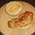 Refried turkey breast is laid on toasted roll