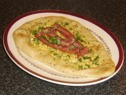 Curried Eggs and Bacon on Naan Bread Recipe