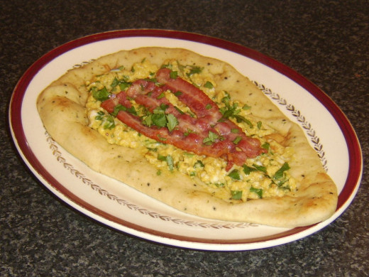 Curried Scrambled Eggs on Naan Bread with Bacon