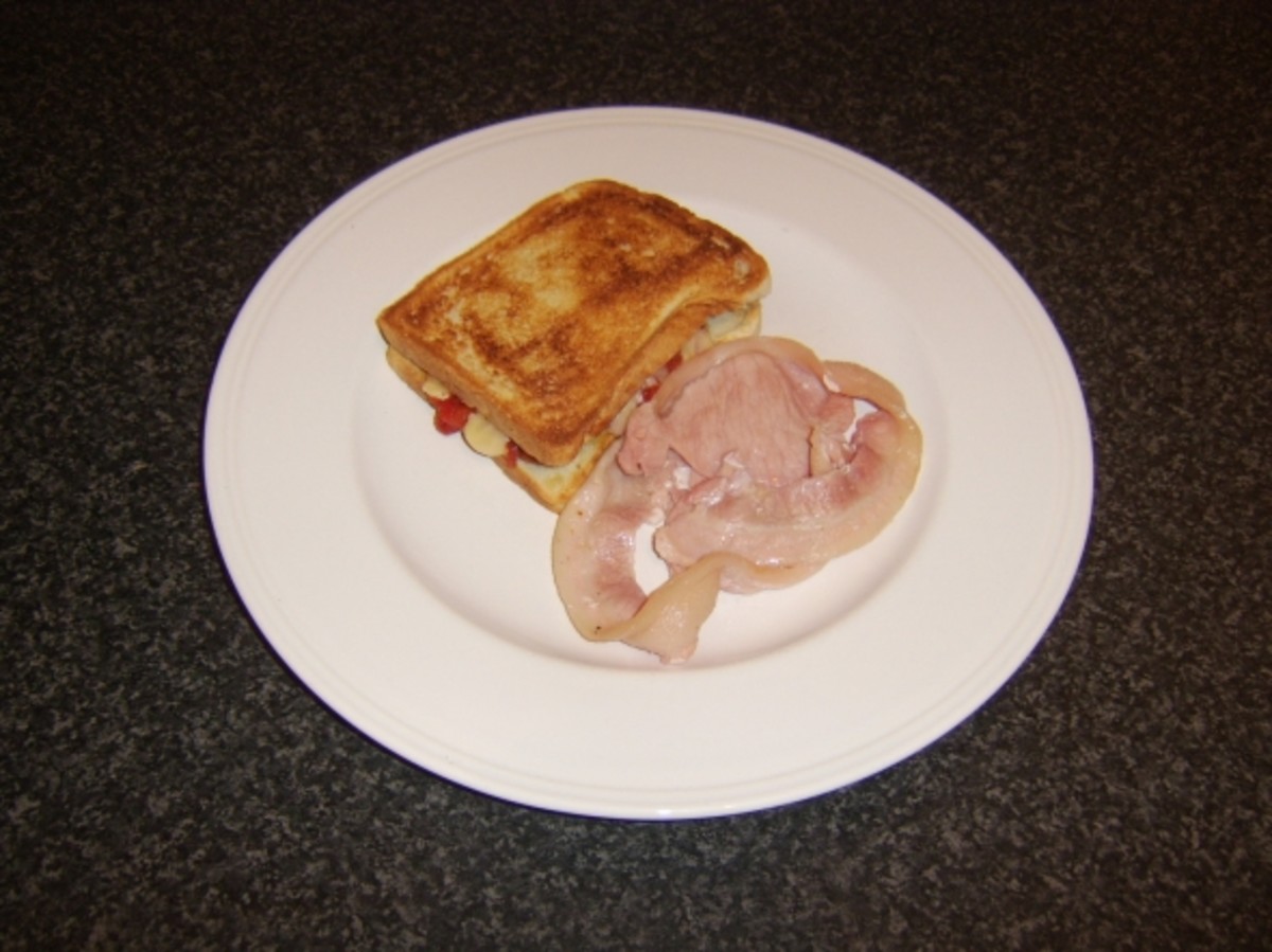 Toastie and bacon are plated