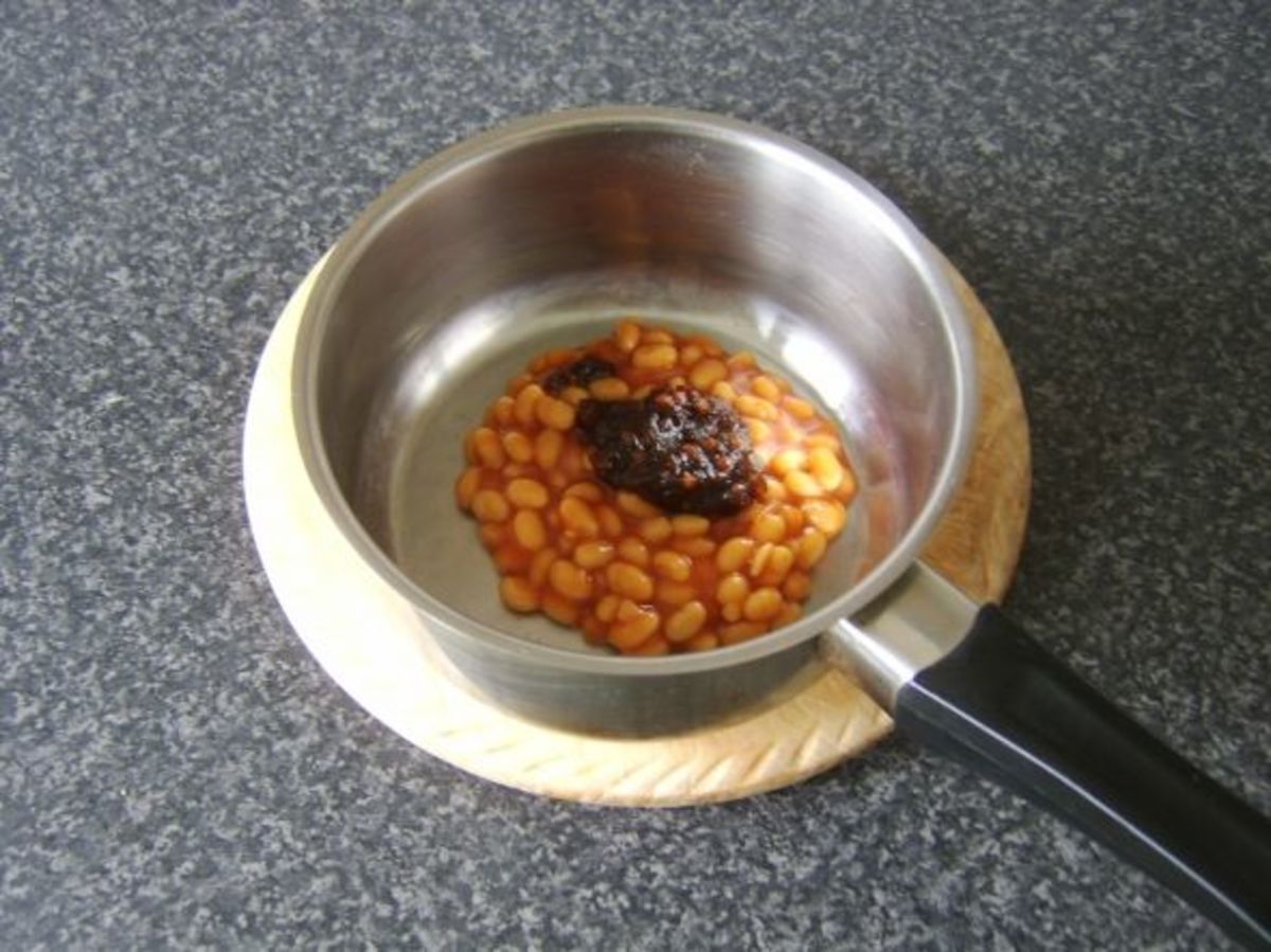Pickle is added to baked beans for heating