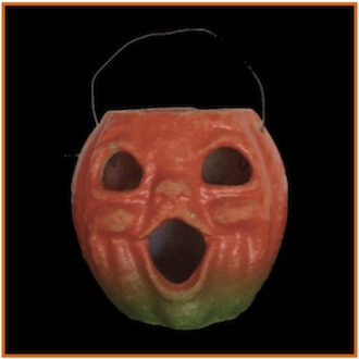 My paper mache jack-o-lantern candy cachepot. The paper features were lost long ago.