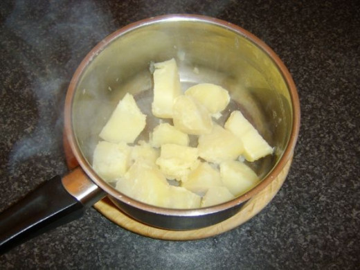Potatoes are allowed to steam and dry after they are boiled