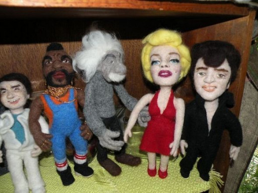 The great photo shoot of a perfect mix of brains, beauty and brawn and swiveling pelvis. Albert appears to be relatively smitten. Who do you think has "roving" eyes?From L to R: Jackie Chan, Mr. T, Albert EInstein, Marilyn Monroe and Elvis.