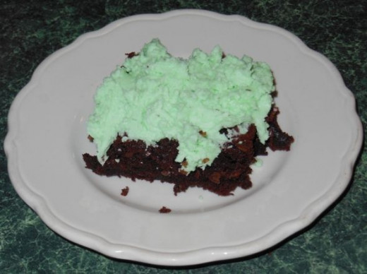 Brownies are delicious with the minty frosting.