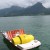 Paddle boat in the lake by St. Wolfgang in Salzkammergut Paddle boat in the lake by St. Wolfgang in Salzkammergut