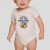Organic Baby Bodysuit. Easy put-on/take-off unisex design. Sizes: 3-6M, 6-12M, 12-18M, 18-24M. Color: Natural