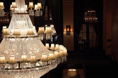 Ornate chandeliers from the Amway Grand Plaza Building.