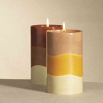 Welcome the fall season and give your room the d�cor of autumn foliage. These Autumn Candle Holders already includes small pillars that can be placed inside the candleholder, and can be re-used. Comes in a set of two.