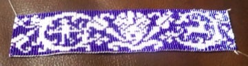 First project created on my Loom.  This is purple and white.  I designed this pattern with the inspiration from a filet pattern from 1900.
