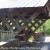 This is a side view near the entrance of the bridge, showing the pretty lattice-pattern used by the builder, Mr. Thurman Horton, in 1894. This is a side view near the entrance of the bridge, showing the pretty lattice-pattern used by the builder, Mr. Thurman Horton, in 1894.