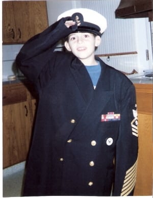 My son at 8 years old wearing Grandpas uniform. ((1994)