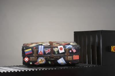 Suitcase With Travel Stickers