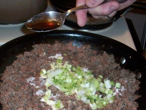 Add oyster sauce to the ground meat