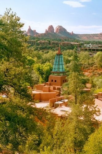 This building is located toward the end of Schnebly Hill Road, just as it enters Sedona. I think it is some kind of new age religious center
