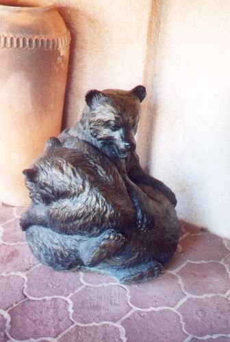 Two bears, sculpture. Probably both are by the same artist as the eagle, and particularly the wolf and seahorse show a similar style.