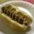 Juicy hot dog cooked over an open flame, tucked in a bun, & drizzled with tangy mustard! Juicy hot dog cooked over an open flame, tucked in a bun, & drizzled with tangy mustard!