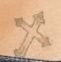 Britney cross tattoo