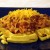 Place 2 scoops of chili on the cornbread waffle and top with shredded sharp cheddar cheese. Then dig in and prepare to be amazed!